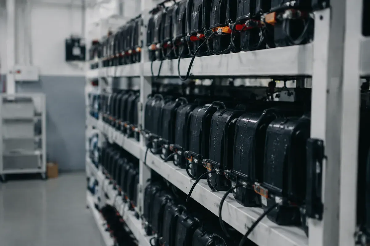 Rows of e-bike battery packs cycling on long-duration aging test racks